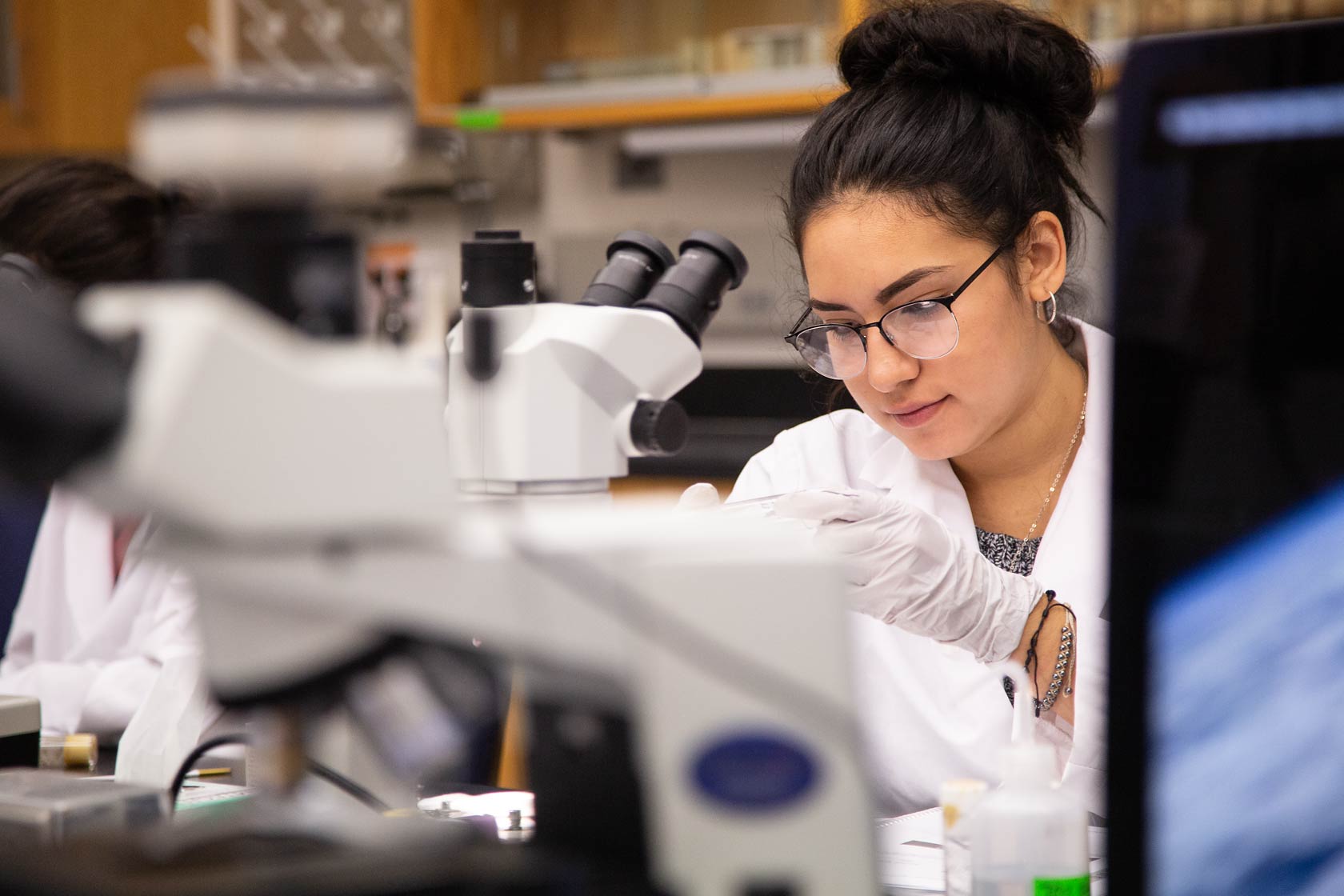 hispanic researcher in lab